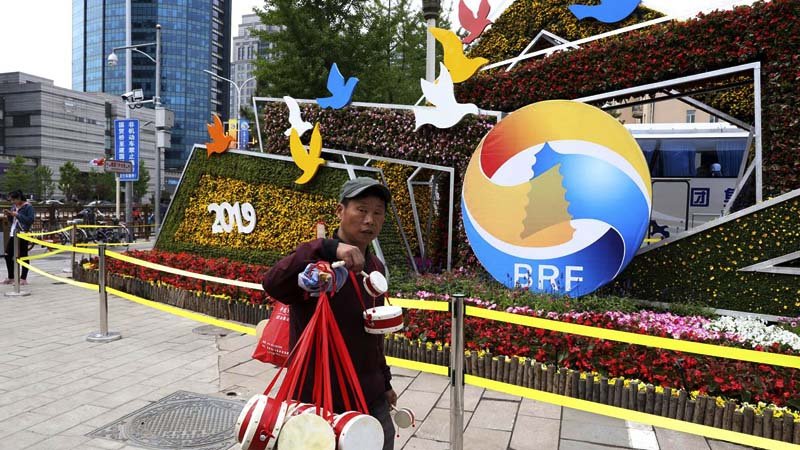 China downplays political impact  of global development push