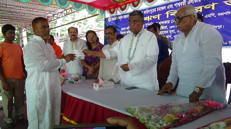 Cheques distributed for purchasing milking cows