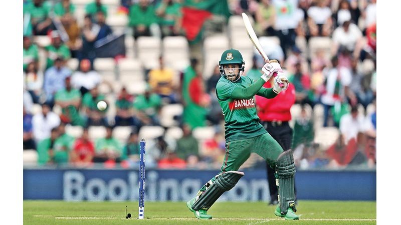 Mushfiq guides Tigers to 262 against Afghanistan