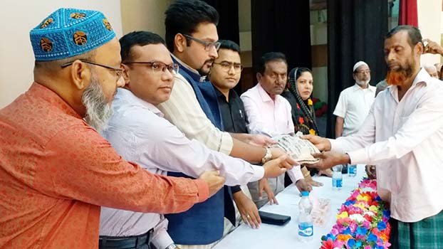 Seeds, fertilizer distributed among farmers in Naogaon