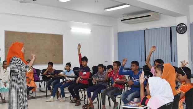 BracU students teach underprivileged children