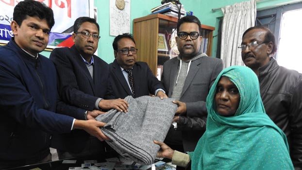 Distressed  people get  free warm clothes  