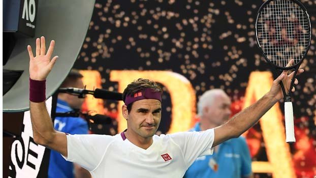 Federer stages great  escape to reach semis