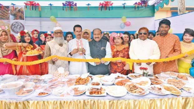 Students welcome spring amid pitha utshob in Bogura