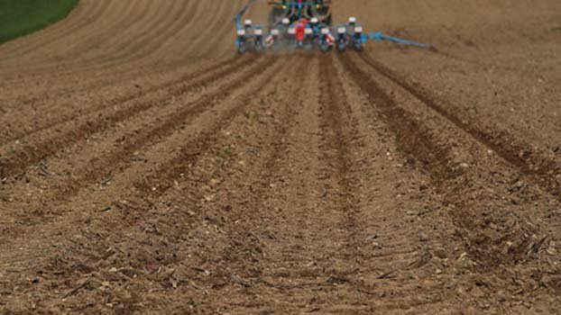 Protest against cutting soil of cultivable land