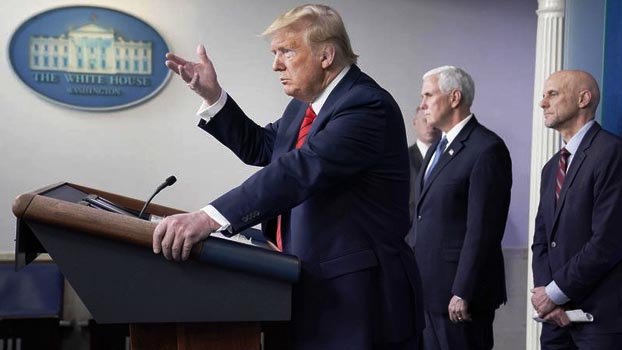 Pressure grows on Trump as hospitals sound virus alarms