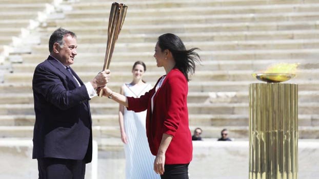 IOC ‘considering different scenarios’ as Olympic flame arrives in Japan 