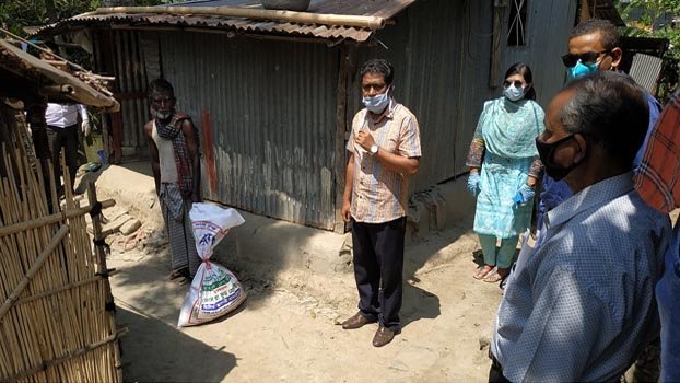 District admin  distributes relief goods to people