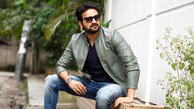 Symon gives food to 500 families