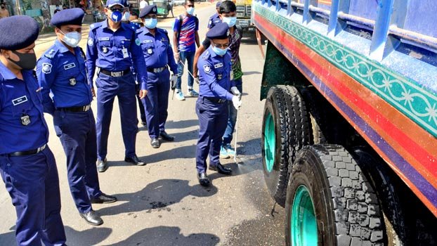 Police sprays disinfectant on vehicles to prevent coronavirus