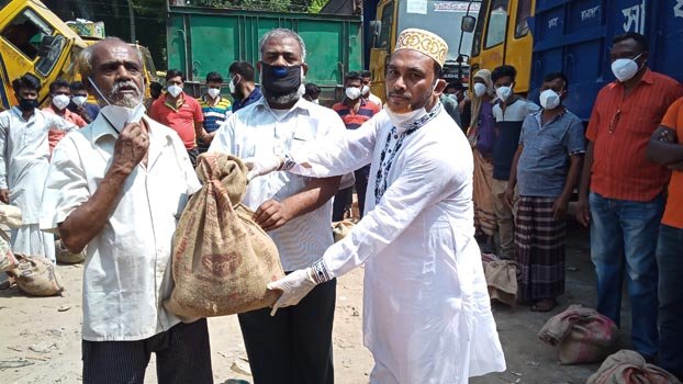 Food, facemask distributed among truck drivers, poor