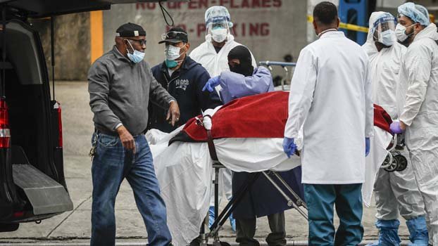 US death toll overtakes  Italy’s as Midwest braces