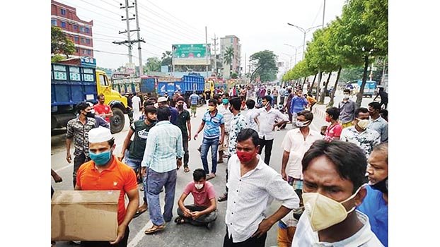 Transport workers stage demo on Dhaka-Aricha highway