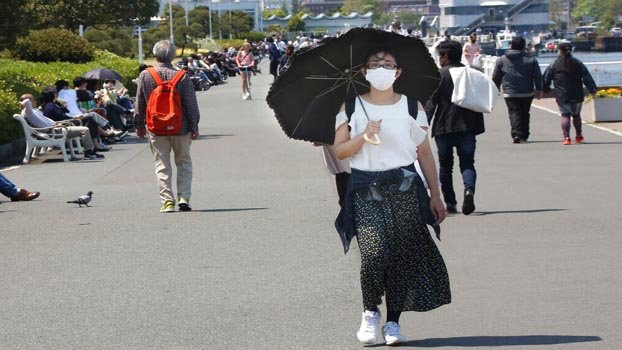 Health officials urge virus  vigilance as lockdowns ease