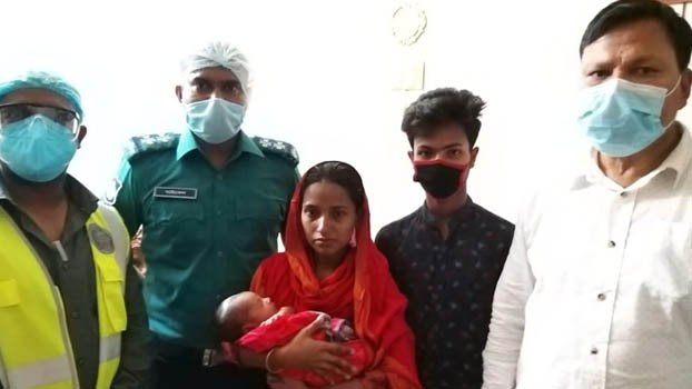 The sold child now  on mother’s lap