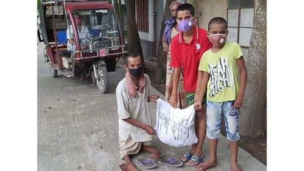 Former student leader distributes food items