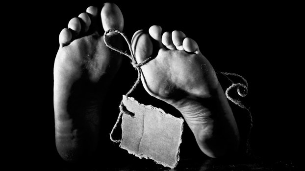 Youth’s body found lying behind house