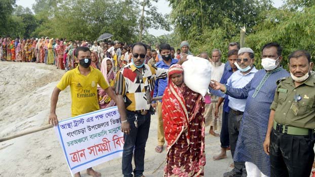Relief distributed among flood-hit people in Rangpur