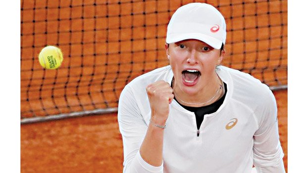 Swiatek bundles top seed Halep out of French Open