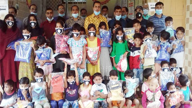 Horijon children get new clothes marking Durga Puja