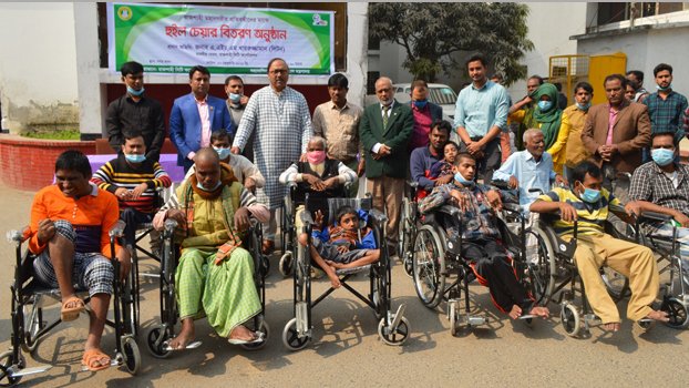 RCC distributes wheel chairs among disabled people