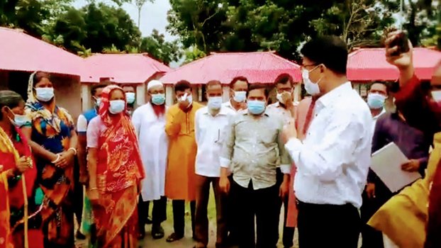 DC inspects shelter houses in Chitalmari