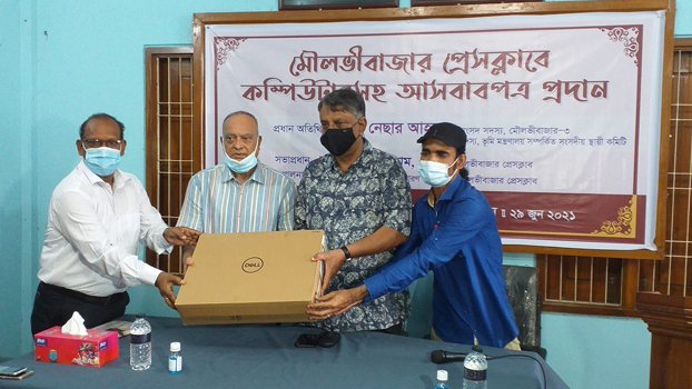 MP gifts computers,  furniture to journos