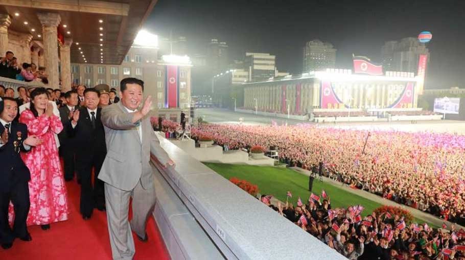 N Korea’s Un presides over late-night parade