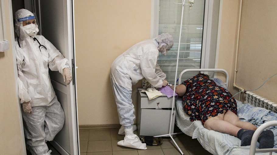 Russian Covid spike persists, setting new death record