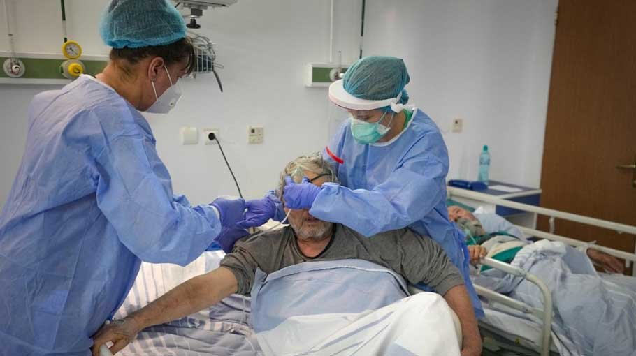 As virus surges in Eastern Europe, leaders slow to act
