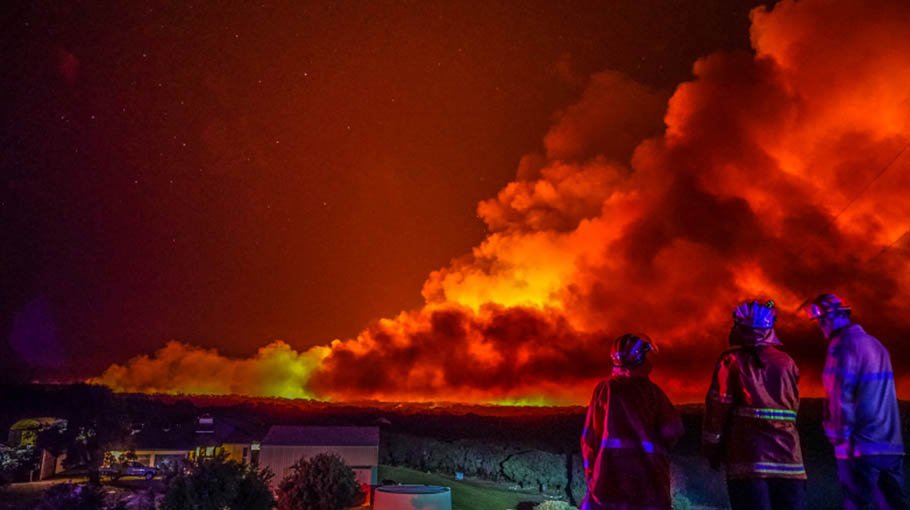 Australia fights bushfires in west, floods in east