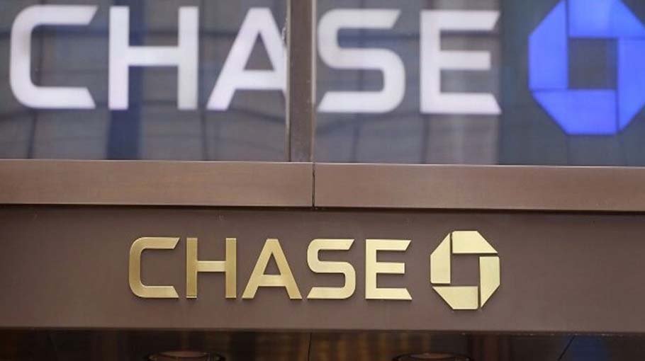 Higher costs hit JPMorgan Chase but it reports huge profits