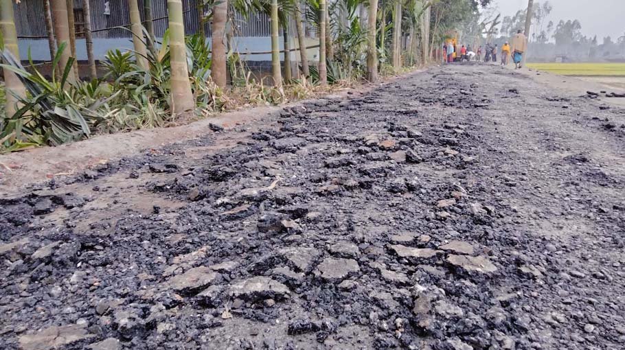 Road in ramshackle before repair finishes