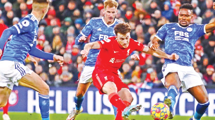 Liverpool stay in title hunt