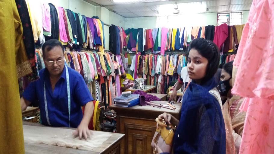 Tailors in Tangail busy handling Eid orders