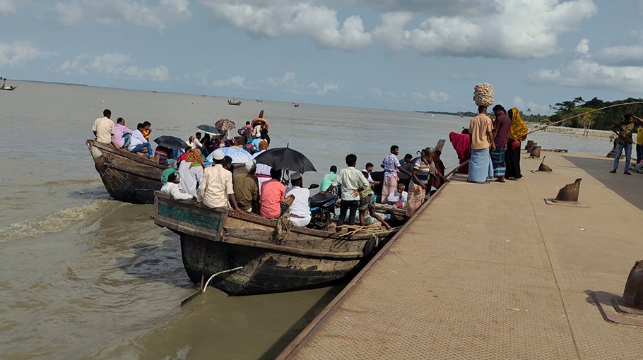 Passengers risk their lives to cross danger zone of Meghna