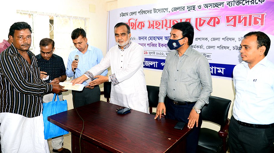 Cheque distributed to freedom fighters, destitute people