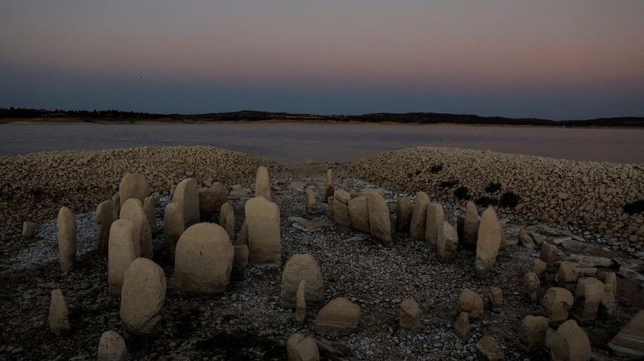 Drought exposes ancient stones, WW-II ships 