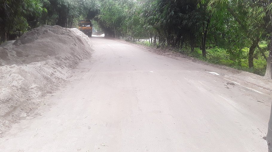 Sand business runs by blocking road in Panchagarh