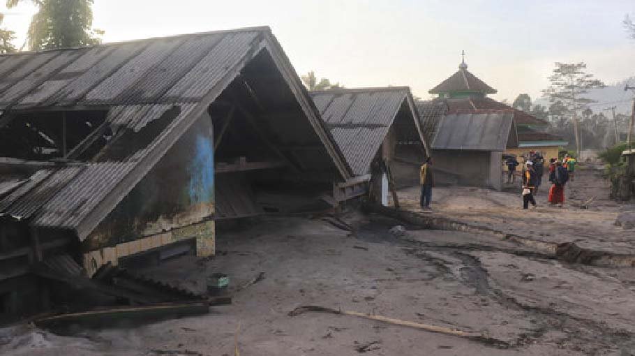 Homes buried, bridge damaged