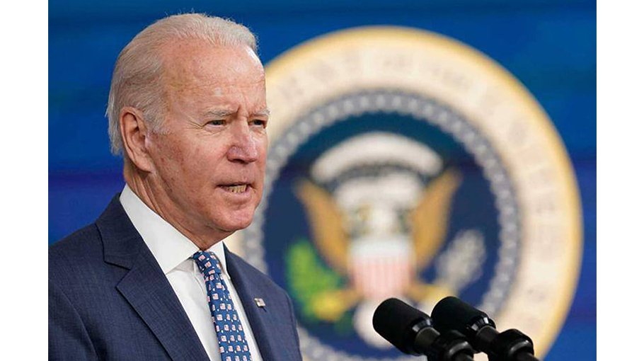 On anniv of US Capitol assault, Biden decries violence