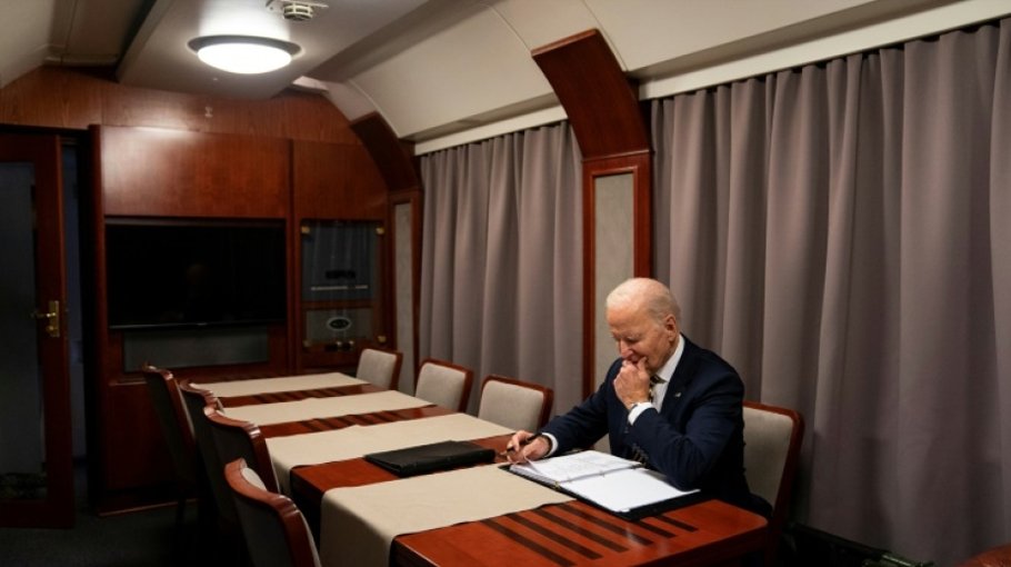Darkened plane, silent overnight train: how Biden got to Kyiv