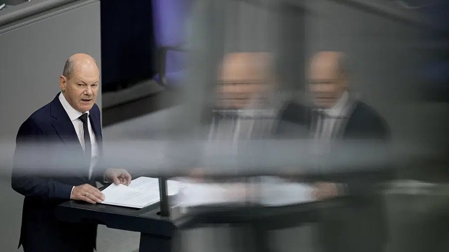 German leader defends deal to stop migrants at EU borders