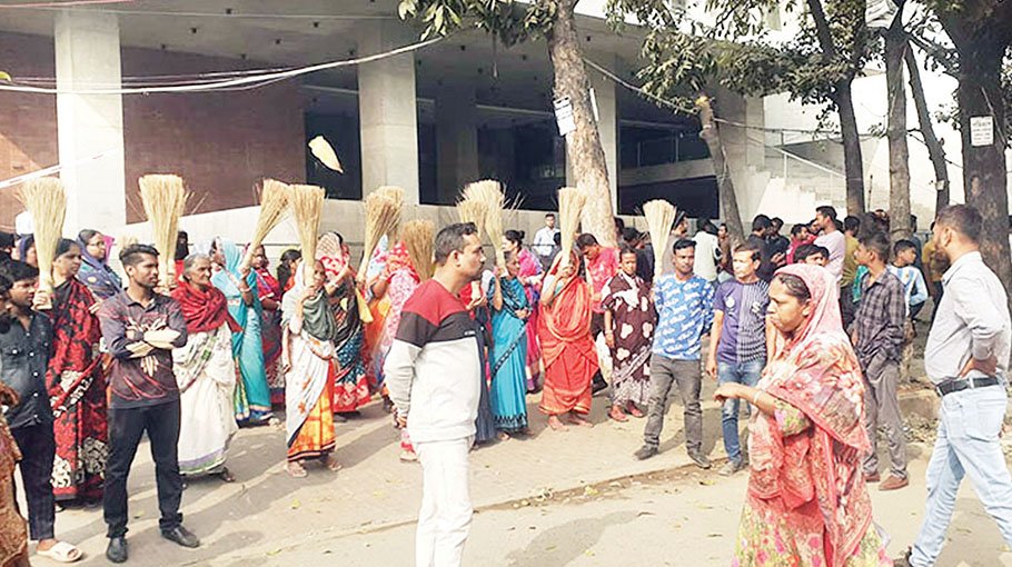 ‘Broom protest’ against Dr Yunus