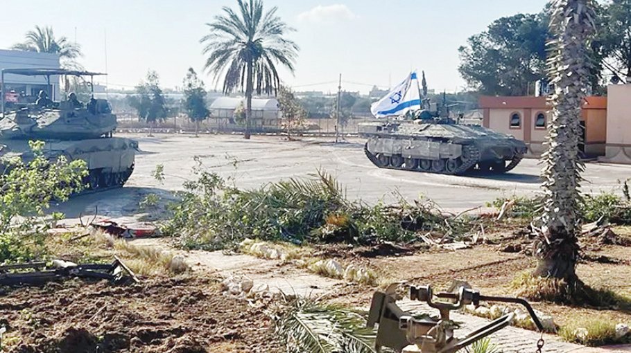 Israel seizes Rafah crossing, launches assault, cuts off  aid route