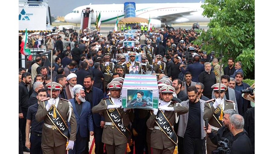 Tens of thousands gather for Raisi funeral procession in Tehran