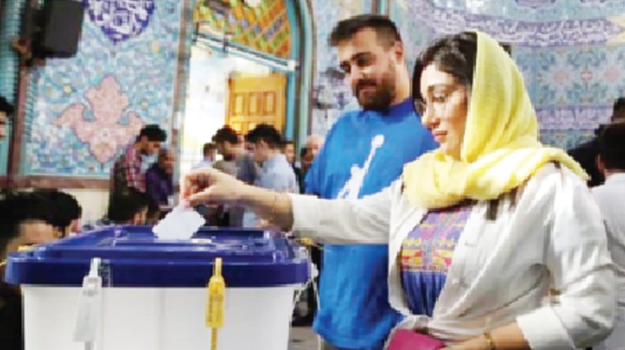 Iran’s presidential election moves to run-off after  low turnout