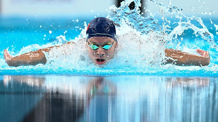 Poster Boy Marchand sets Olympics record