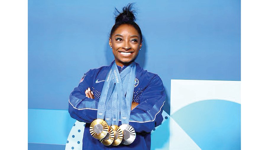 Biles proud of showing her strength