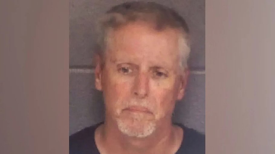 Father of US school shooting suspect charged with murder